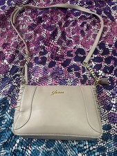 a Guess brand crossbody bag